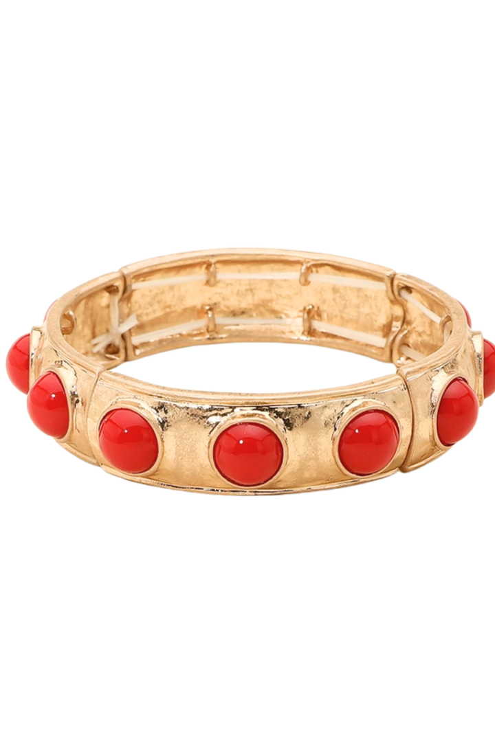 Elevate your accessory game with this striking beaded stretch bracelet, designed to seamlessly transition from day to night. Featuring lustrous pearl-like bead accents and a modern rounded design, this piece delivers an effortless blend of elegance and contemporary edge. The comfortable 0.6" height and stretchable fit ensure all-day wearability without compromising on style.