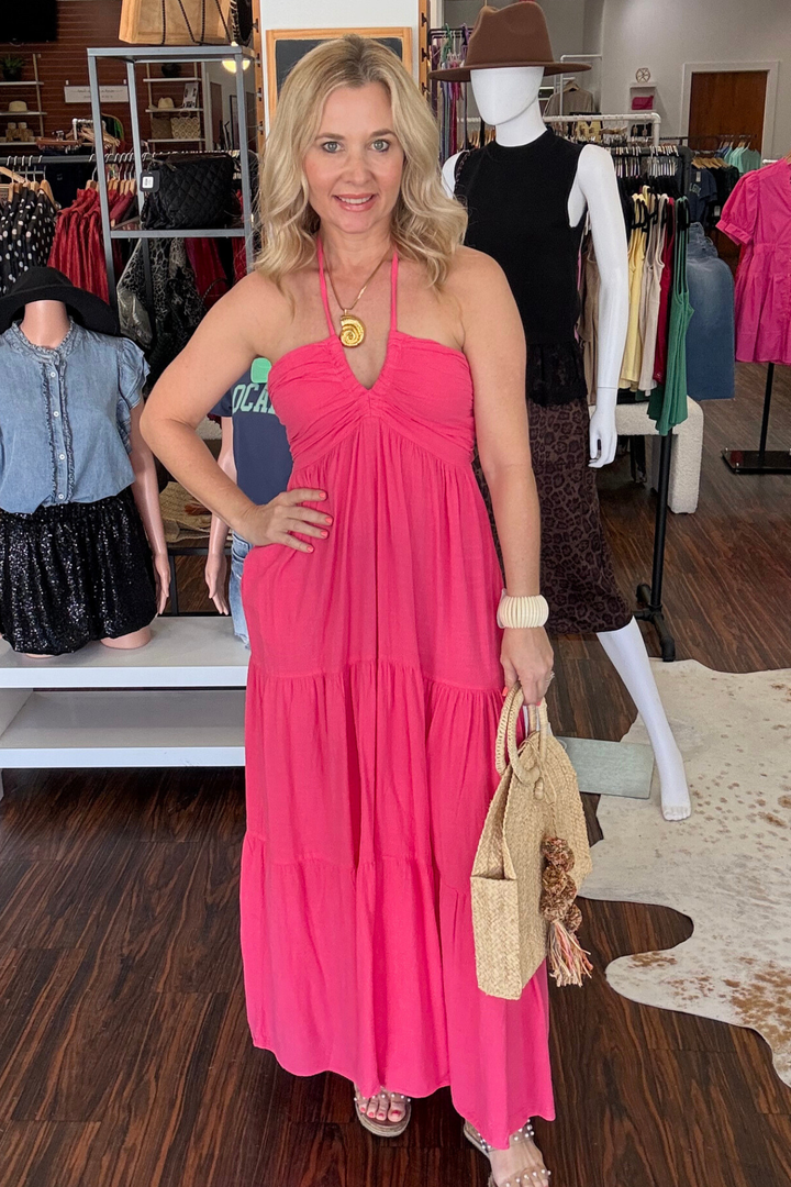 Carlotta Maxi Dress

Introducing the elegant and sophisticated Carlotta Maxi Dress. Made from high quality natural cotton, this dress boasts a stunning open back design with pockets and a halter tie at the neck and a tie closure at the back. From brunch to a day out, this dress is the perfect choice for any occasion. Machine wash and hang dry to avoid shrinking. Model is wearing size small.&nbsp;