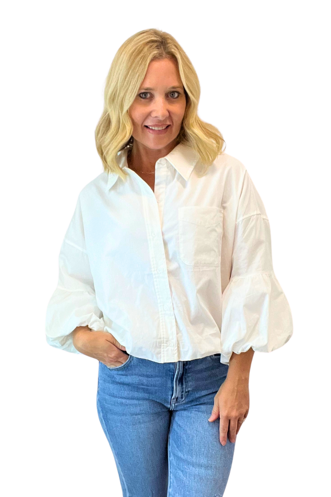 Collared Button-Down Bubble Top. Featuring a chic collared neckline with a button-down placket, drop shoulder design, and 3/4 sleeves with balloon cuffs. The bubble hem adds a touch of whimsy to this sophisticated top. 