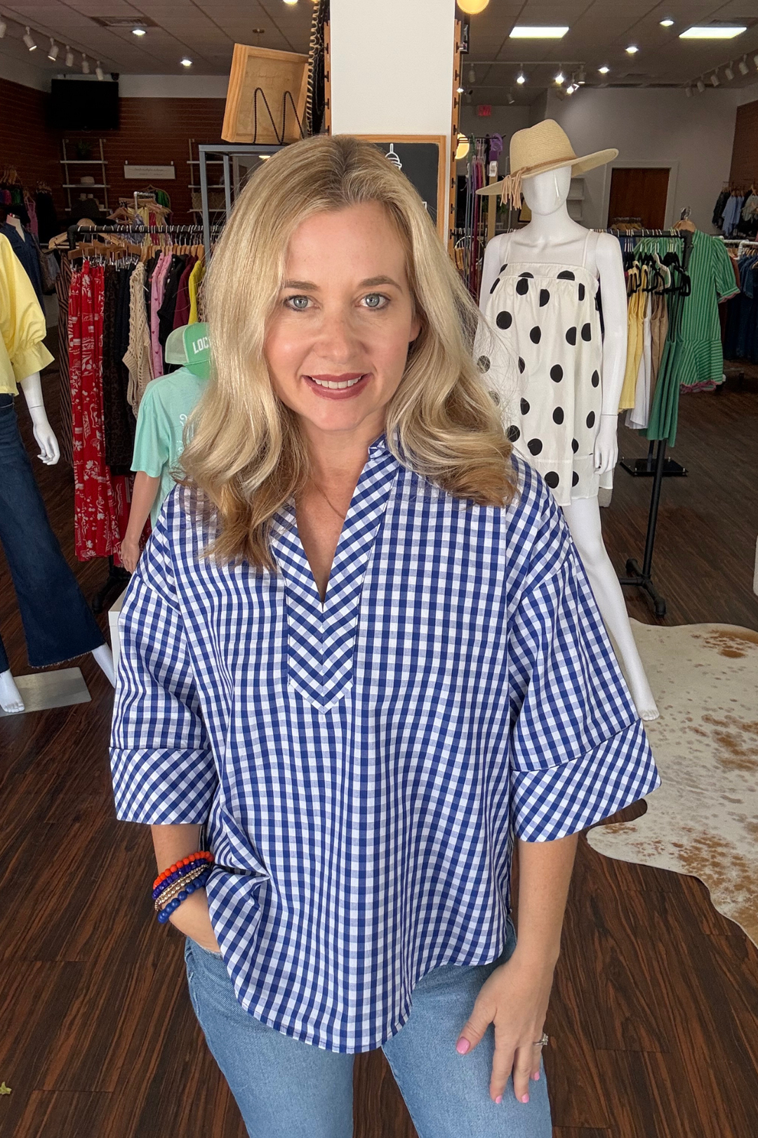 Gingham 3/4 Sleeve Top

Effortless charm meets timeless style with this gingham print top. The split V-neck with pointed collar creates a flattering neckline, while 3/4 sleeves with buttoned cuffs add a polished touch. Crafted from lightweight woven fabric that's non-sheer and unlined, it's perfect for layering or wearing solo. A versatile piece that transitions seamlessly from casual days to dressed-up occasions.