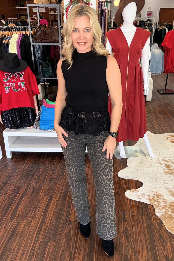 These High Rise Leopard Print Slim Wide Jeans offer a modern and stylish twist to your wardrobe. With a high rise and slim wide leg, these jeans provide a comfortable stretch for all-day wear. Featuring 5 pockets and a finished hem, they are both practical and fashionable.