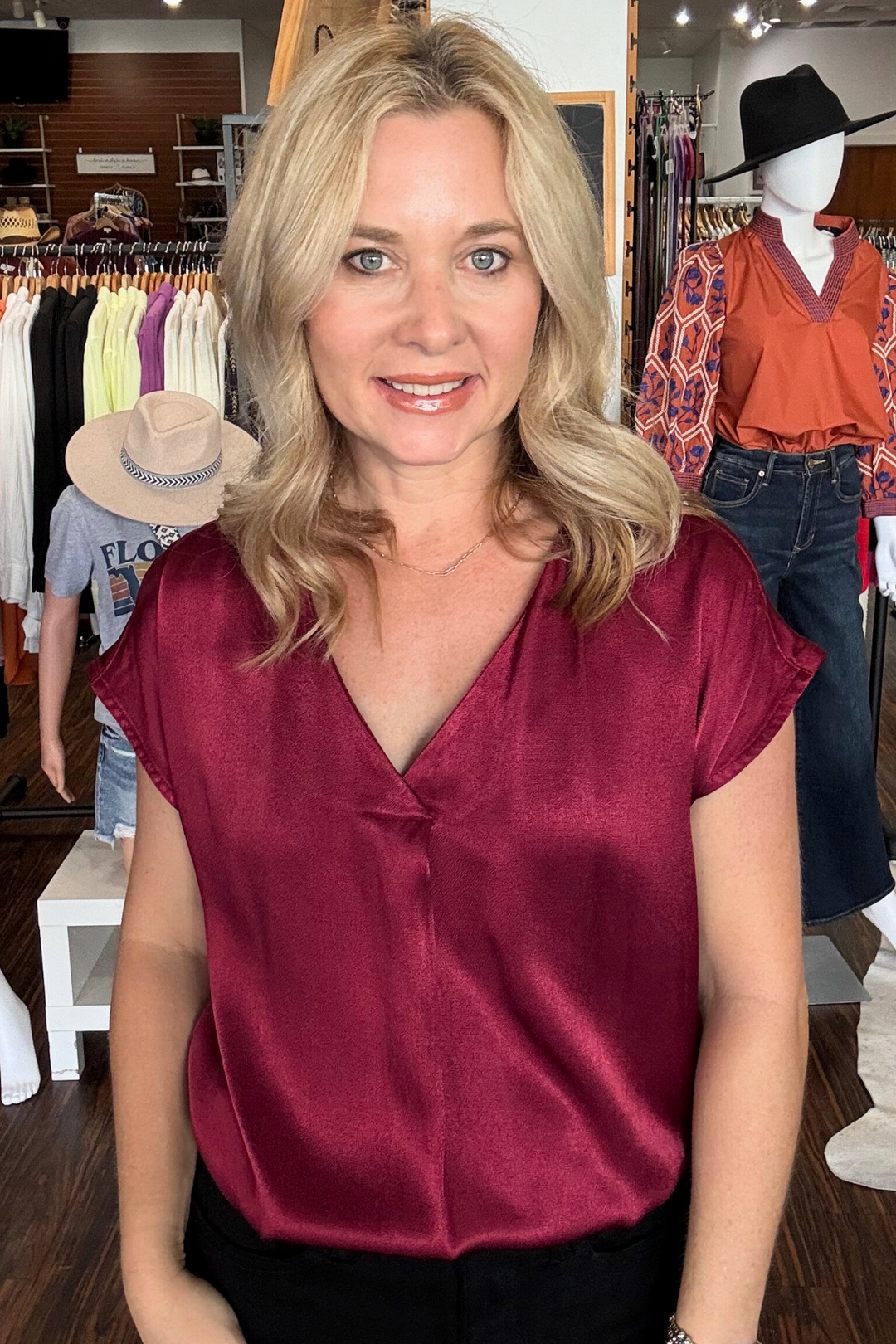  Featuring a v-neckline and short sleeves, it's the perfect combination of sophistication and comfort. Plus, it drapes beautifully on any figure. 52% Viscose, 48% Rayon. 