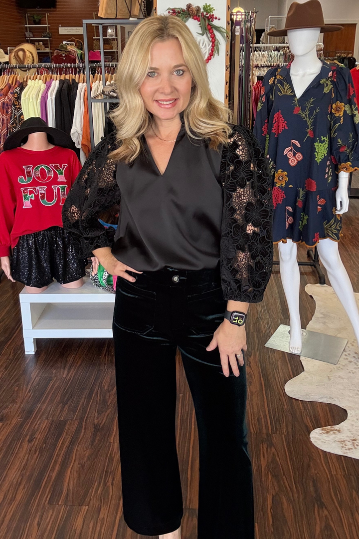 Lace Long Sleeve Silk Top

Elevate your holidays with this sophisticated silk top, featuring delicate lace sleeves that add an unexpected touch of elegance. The flattering v-neckline creates a refined silhouette, while the luxurious silk fabric drapes beautifully against your skin. Perfect for layering or wearing solo. 