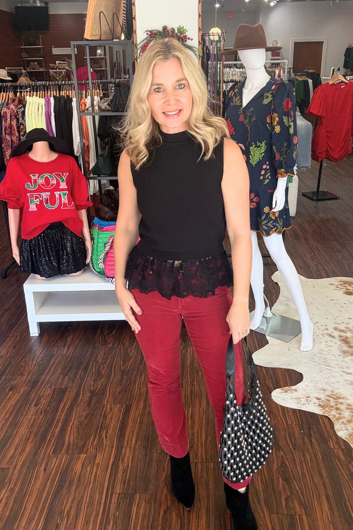 Lace Trim Sleeveless Knit Top

Elevate your wardrobe with this contemporary sleeveless knit top, featuring a chic lace peplum detail that adds movement and dimension. The high neckline provides a polished silhouette, while the soft knit fabric ensures all-day comfort. Perfect for layering or wearing solo, this versatile piece transitions seamlessly from office to evening occasions.