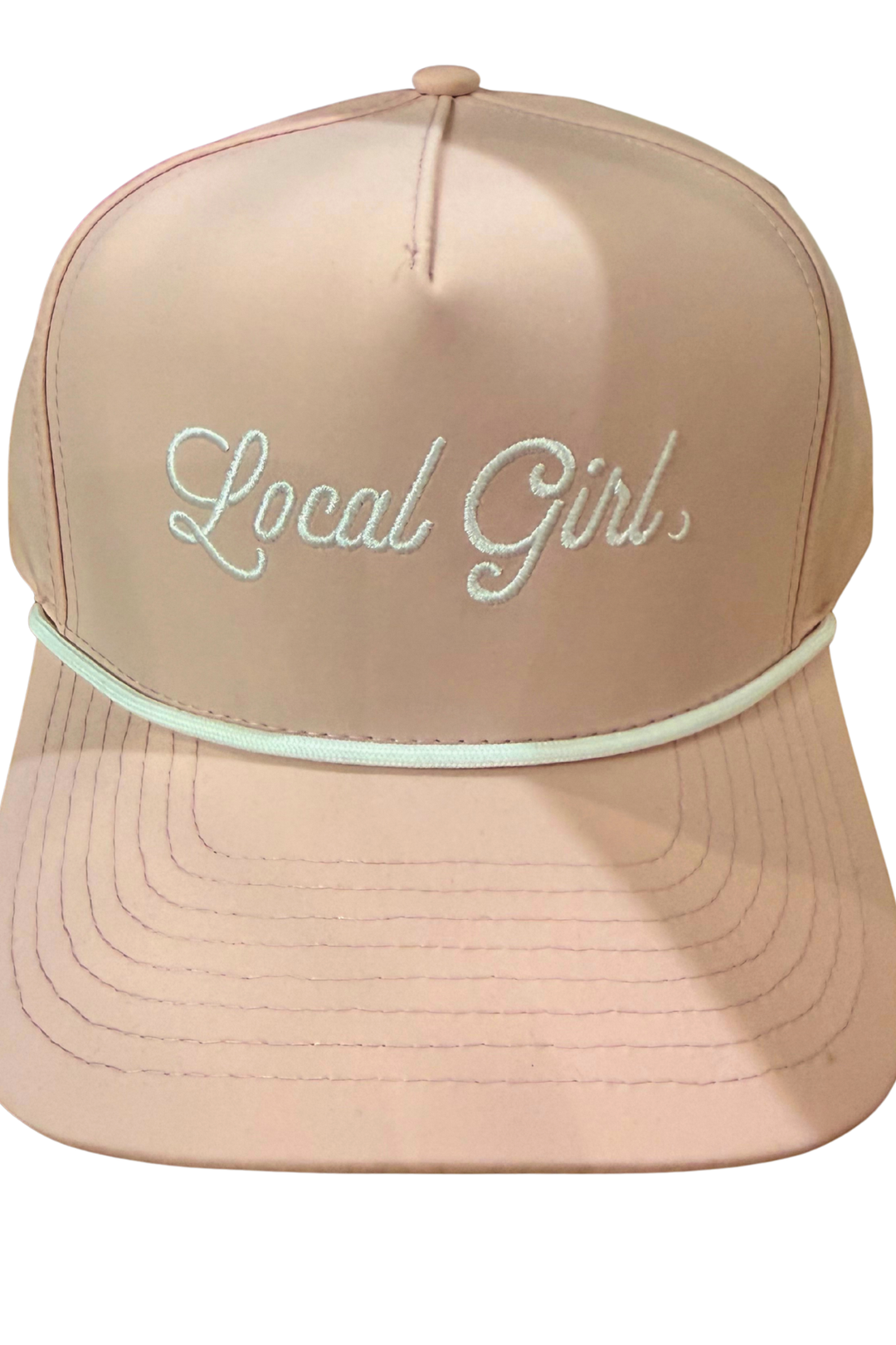 Represent your roots in style with this light pink trucker hat, featuring "Local Girl" emblazoned across the front in crisp white lettering. The classic white rope trim adds a refined touch to the structured six-panel design, perfect for casual outings or making a statement about where you're from. The adjustable snapback ensures the perfect fit every time.