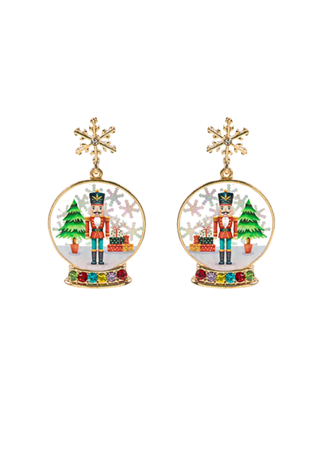 Pair of earrings with snow globe design featuring a nutcracker and Christmas tree on a white background.