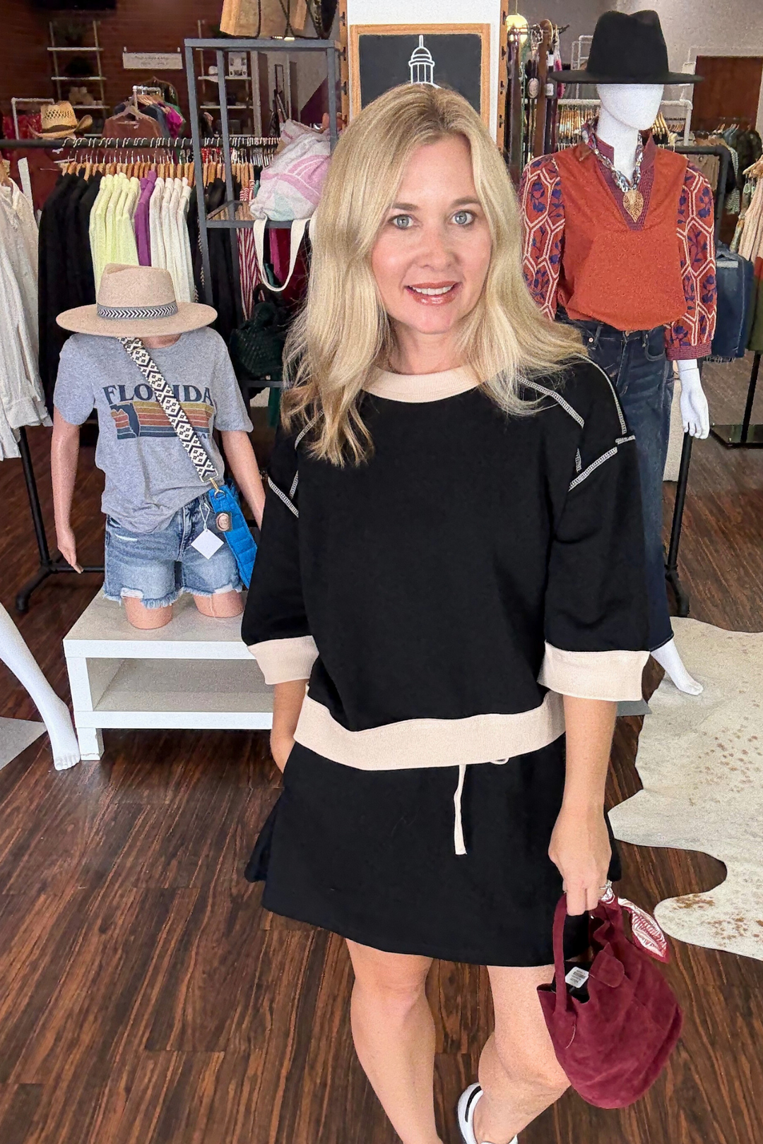 pleated skort set with short sleeve top and cream band detail