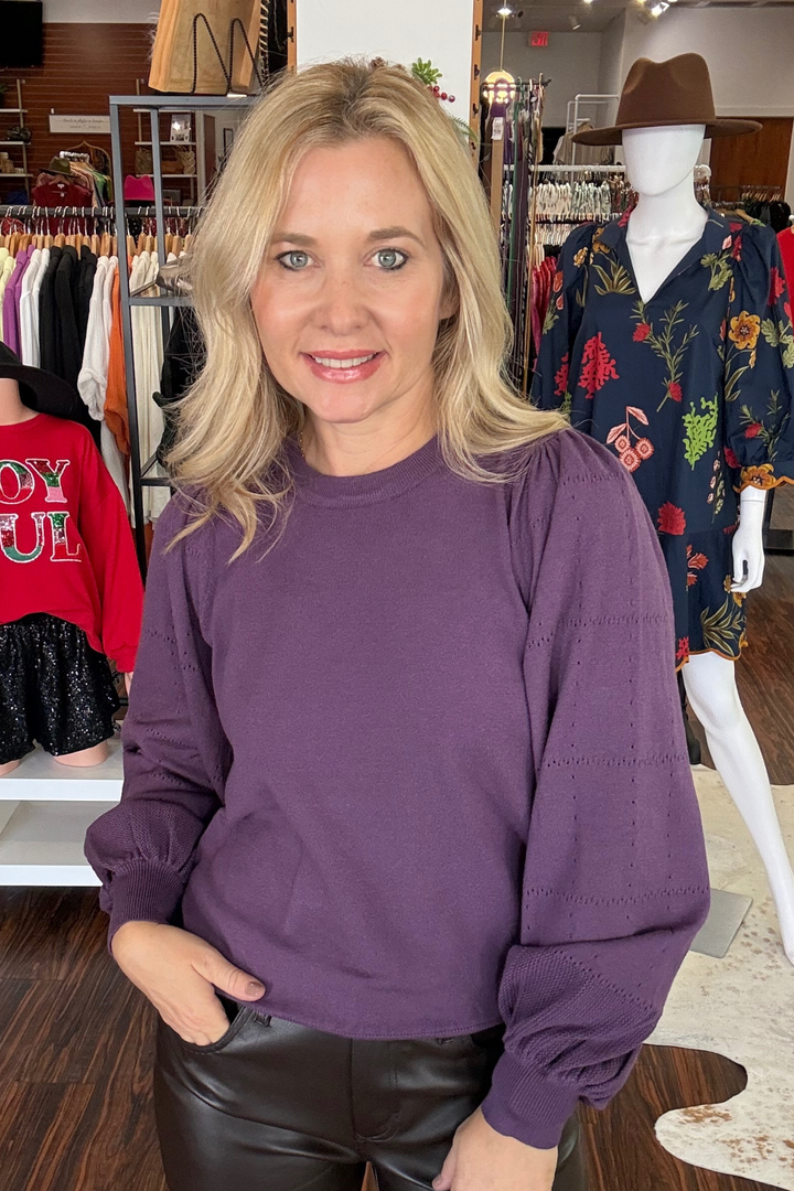 
Featuring romantic puff sleeves with intricate detailing, it's crafted from ultra-soft fabric that feels as good as it looks. The rounded neckline creates a flattering silhouette, while the lightweight construction makes it perfect for layering or wearing solo.