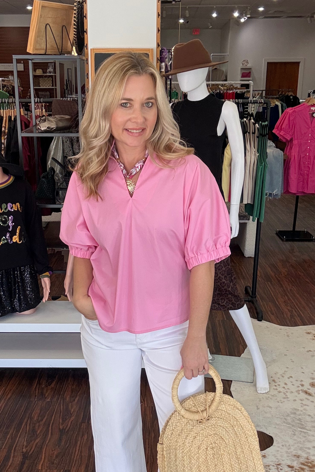 Elevate your everyday wardrobe with this contemporary puff sleeve top. The structured V-neck and standing collar create a polished silhouette, while voluminous sleeves add movement and visual interest. Crafted from lightweight woven fabric that's breathable and comfortable, this unlined piece offers versatility for layering or wearing solo. Perfect for transitioning between seasons, it pairs effortlessly with jeans, skirts, or tailored trousers for an effortlessl