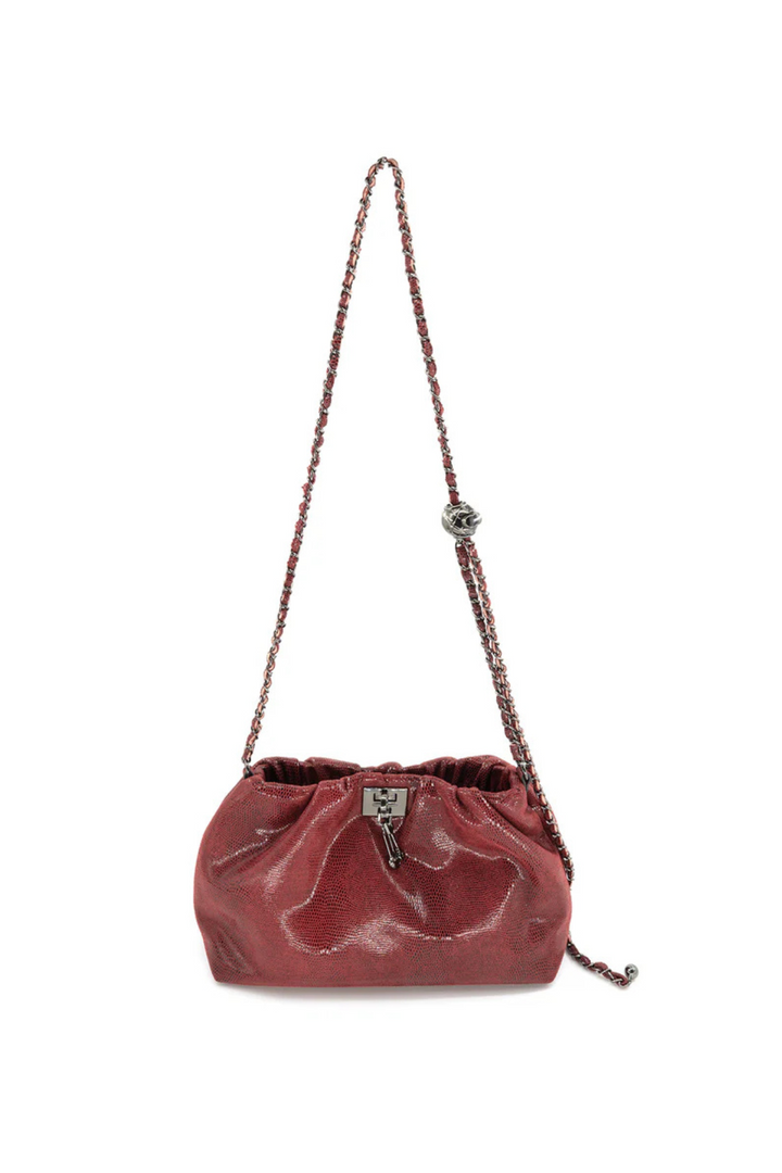 shiny bag with metal cross body strap