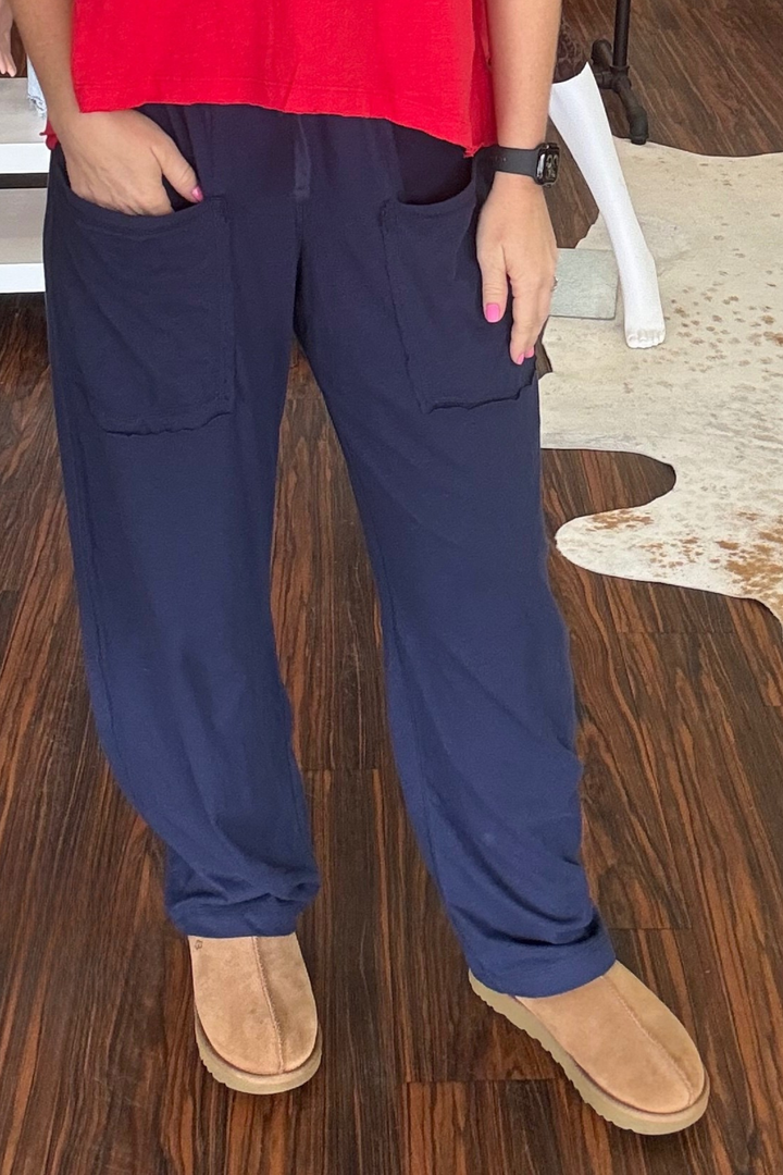 
Effortlessly chic barrel pants crafted from breathable cotton slub fabric. The subtle dart detailing at the inner knees provides structure and shape. Patched front pockets deliver casual utility vibes, and the adjustable elastic waistband ensures a comfortable fit. These relaxed yet refined pants transition seamlessly from weekend errands to casual office days. Model is wearing size small. Inseam: 29