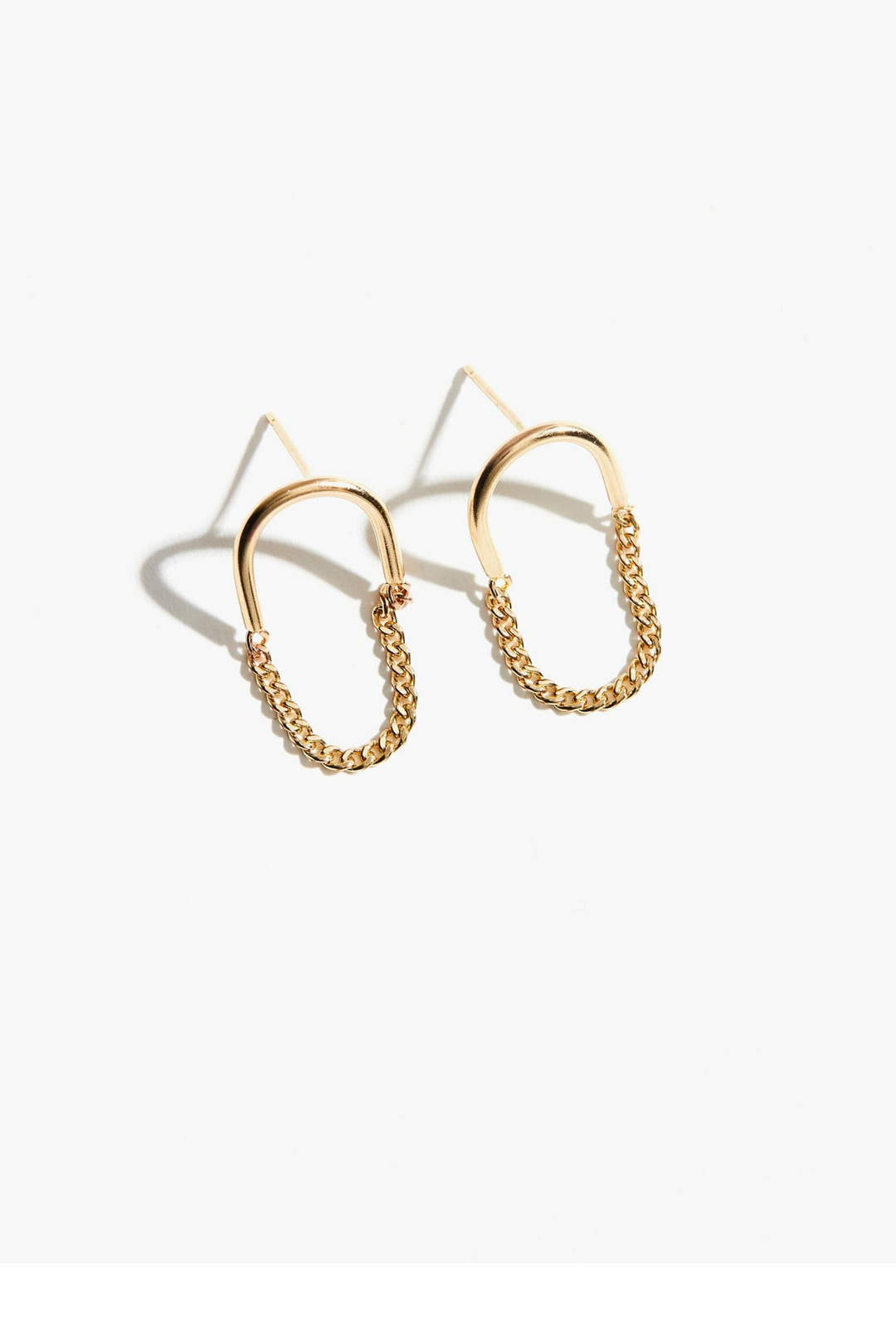 
Elevate your everyday look with these Arc Chain Earrings handcrafted in Nashville using 14k gold-filled posts. The graceful arc design pairs effortlessly with any style, while quality materials ensure lasting wear. A modern essential that bridges minimalist aesthetics with artisanal craftsmanship.
