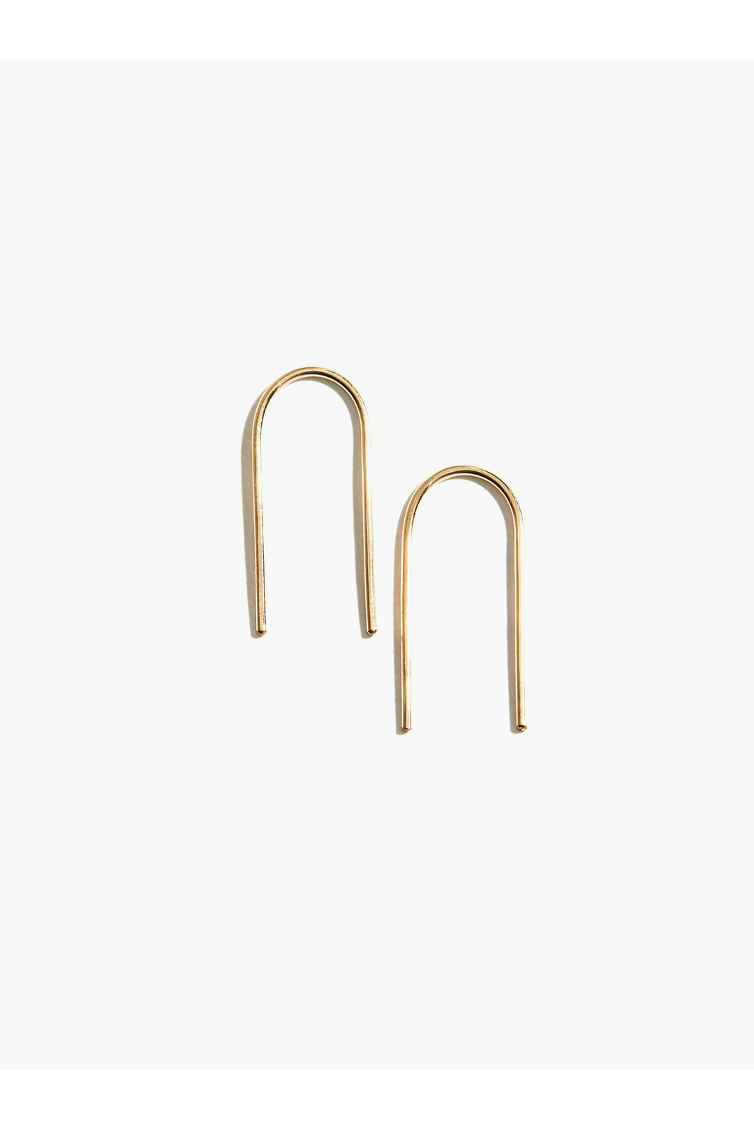 
Achieve effortless elegance with the Able Ear Arch—a backless earring that delivers that coveted dangly aesthetic without the fuss. Crafted from durable 14k gold-fill wire and designed with an 18-gauge, 1-inch arch for a comfortable, secure fit, these handmade beauties are skillfully created in Nashville, TN. Perfect for those who want statement style with zero maintenance.
